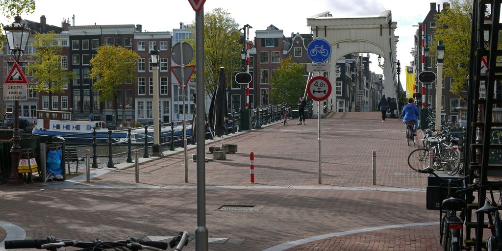 a bicycle parked on the side of a road